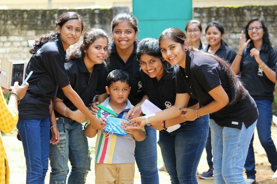 Volunteer teacher with rural school students