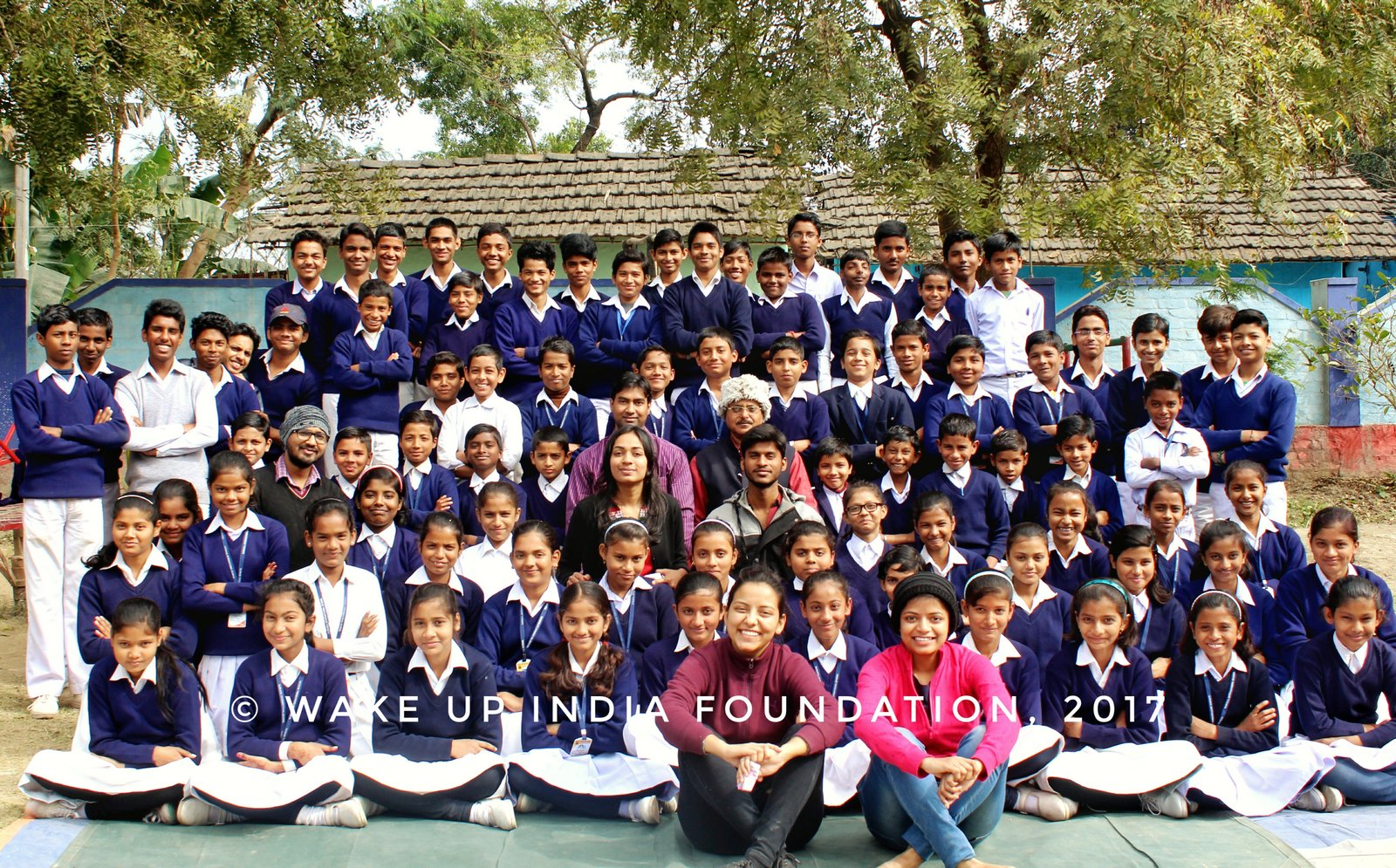 Rural school classroom, students studying